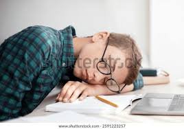 student sleeping peacefully in bedroom at night